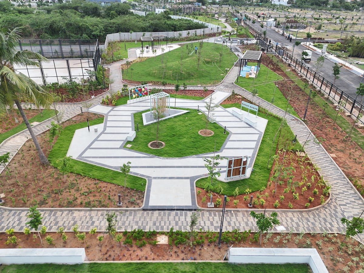 Geometric patterned plaza paving with central lawn from above