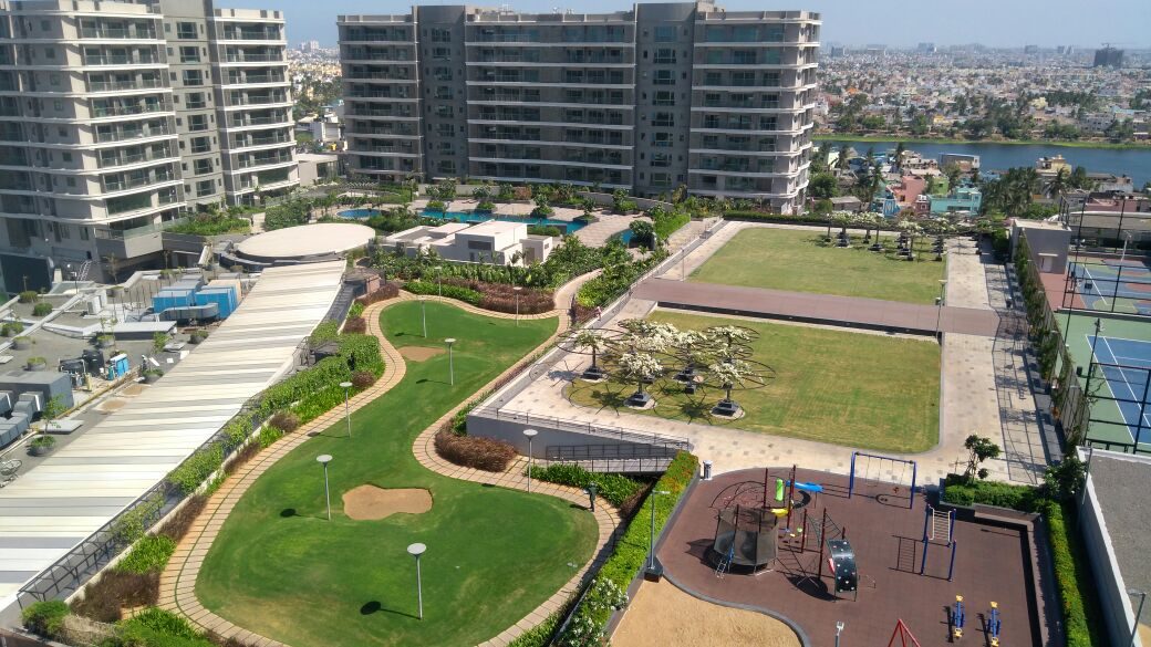 Podium green lawns and playground seen from above